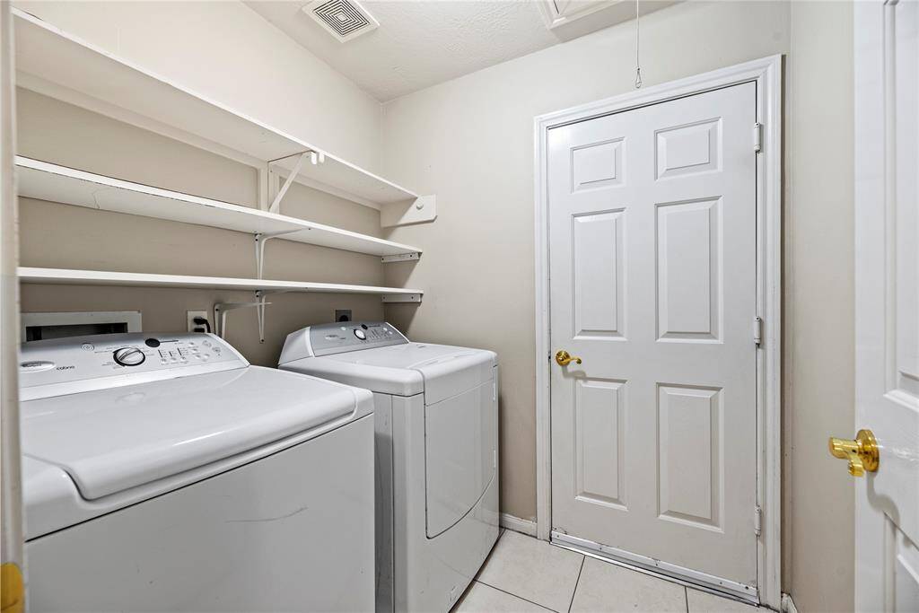 Utility Room with both electric and gas dryer connections
