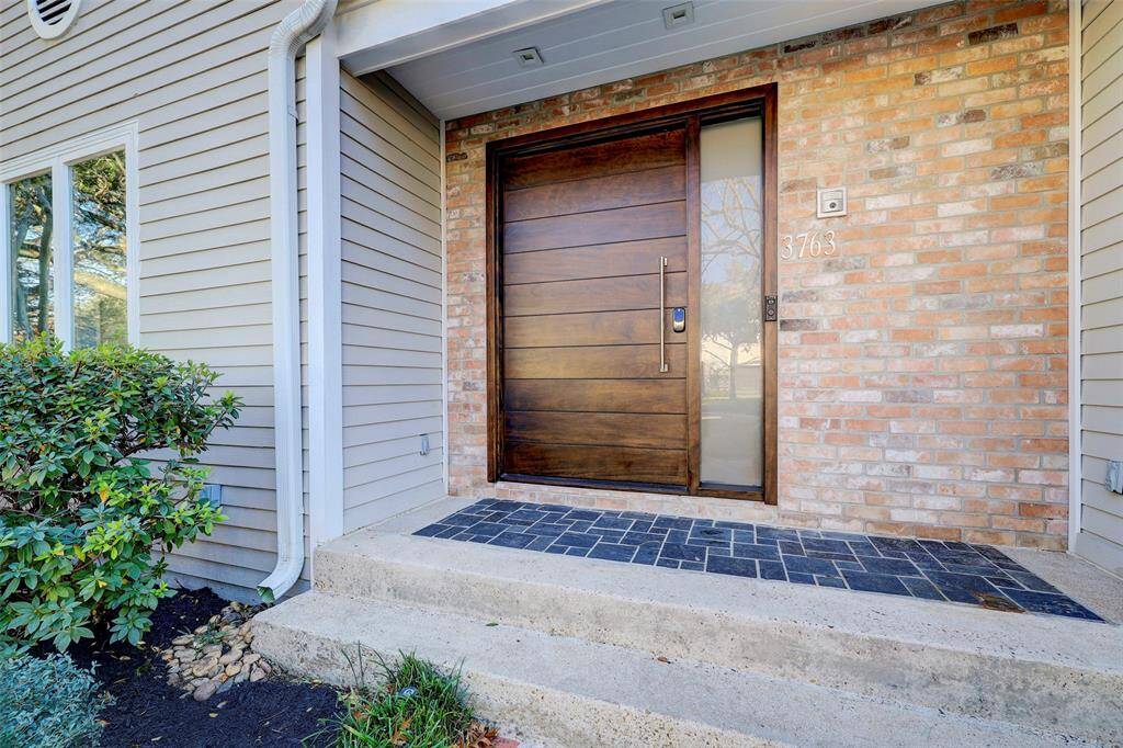Every door in the home is solid wood, custom built and a work of art, like this one. You'll appreciate the craftsmanship throughout.