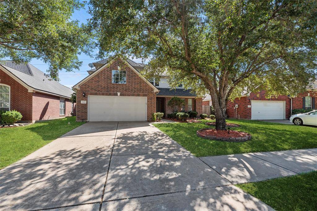 Two car garage and double wide driveway