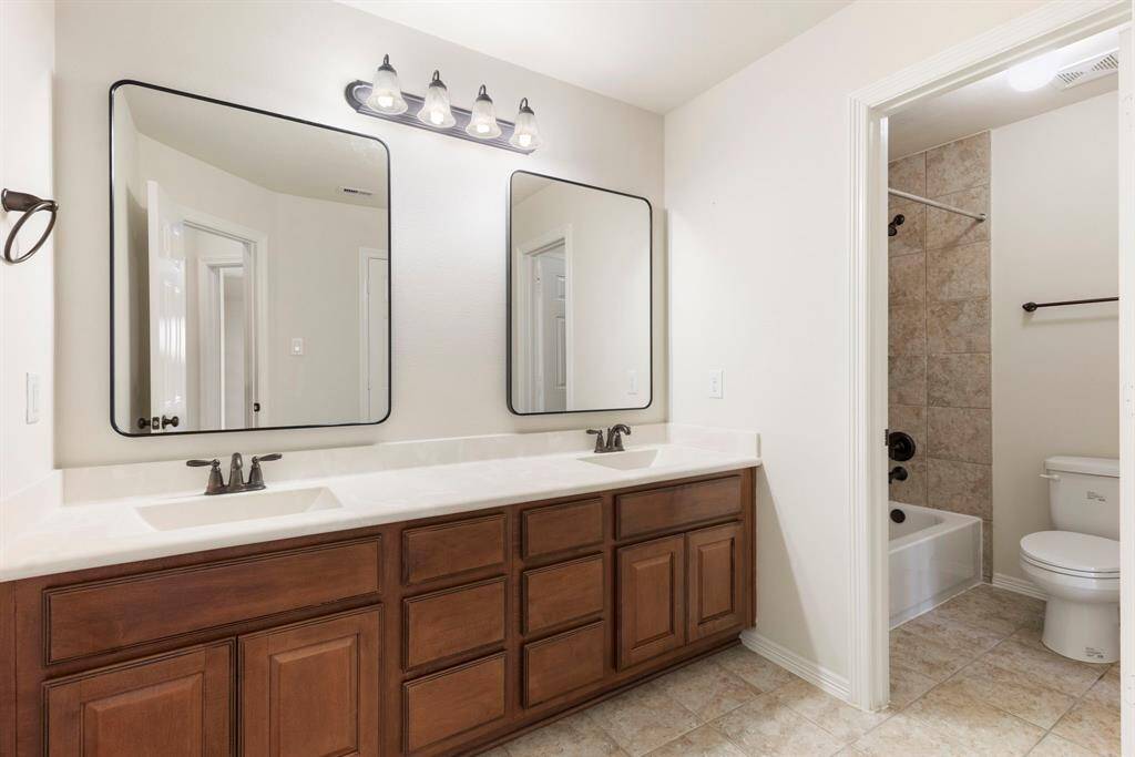 One of two full secondary bathrooms upstairs.