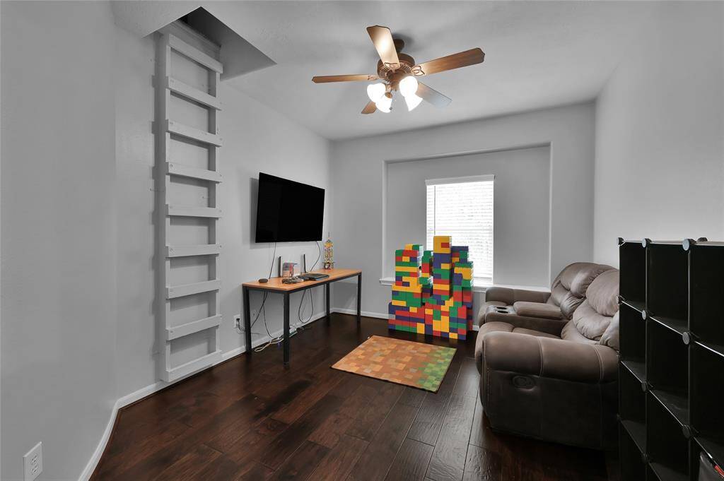 2nd floor bedroom with ladder to hide out space