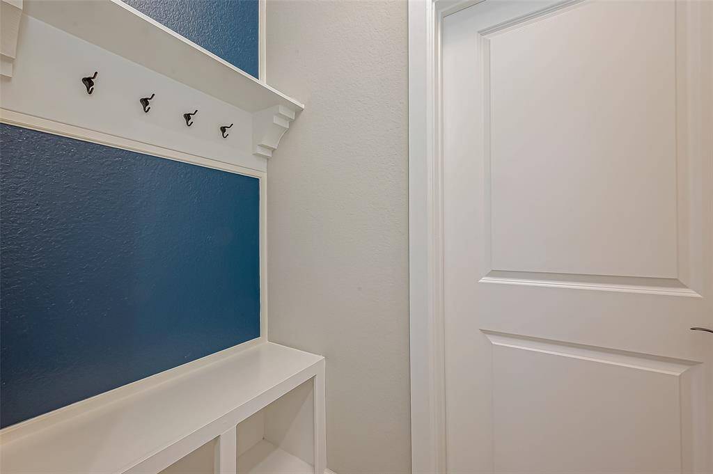View of drop zone as you come in from garage (garage is not pictured, but has epoxy flooring!).