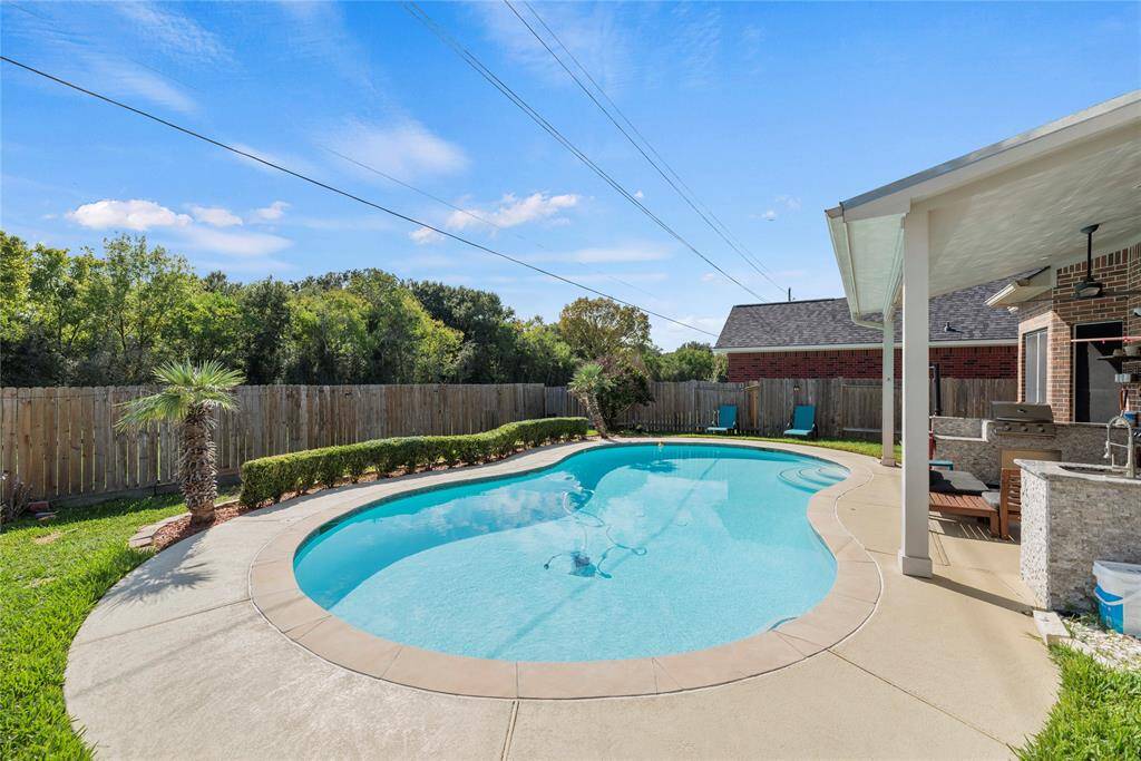 Enjoy this tranquil backyard setting with no rear neighbors