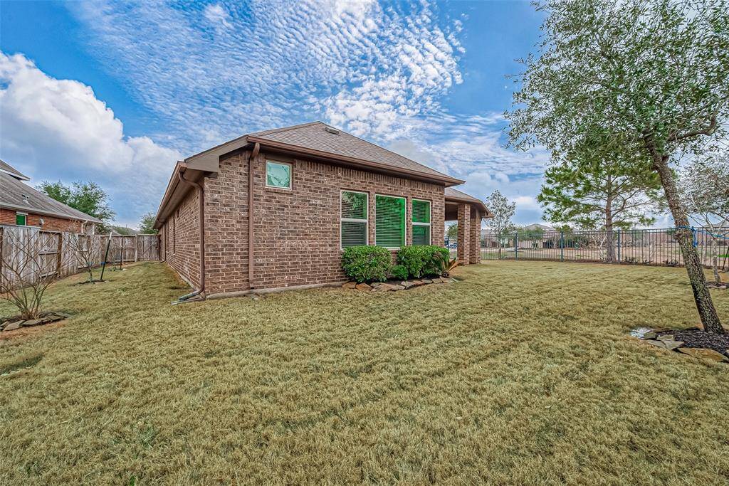 Even the sideyard is spacious.