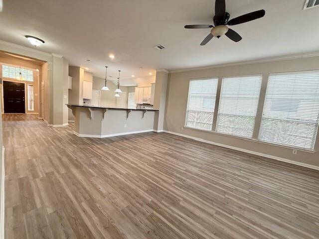 Family room opens up to Kitchen (multiple views)