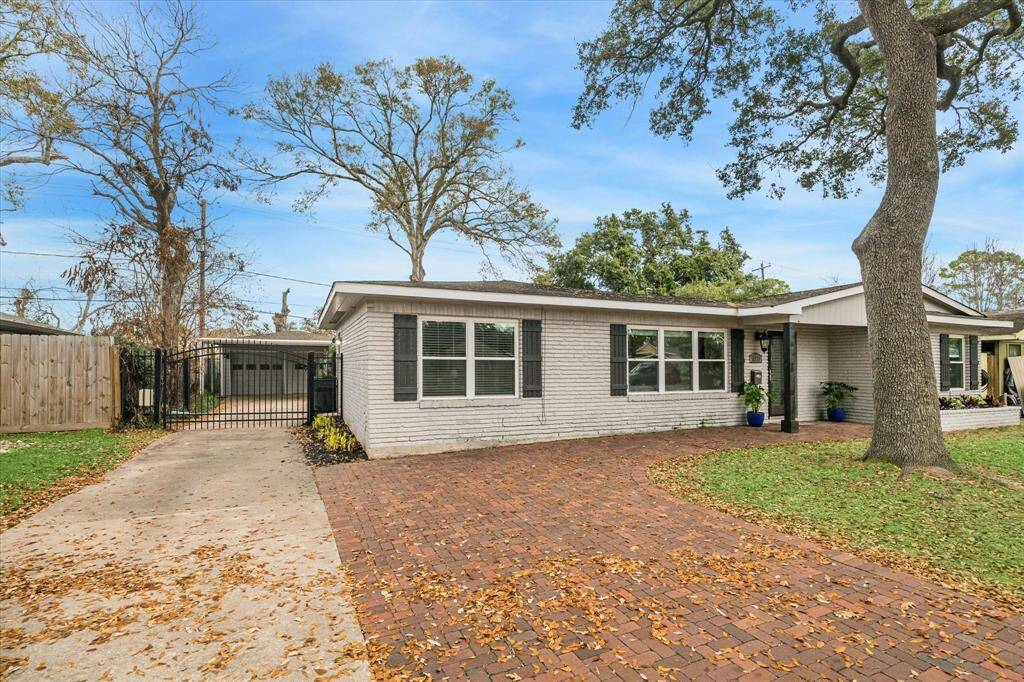 You’ll enjoy plenty of secured off-street parking in the extended ELECTRIC GATED remote control driveway which leads to a two-car garage with convenient remote openers and two car carport.