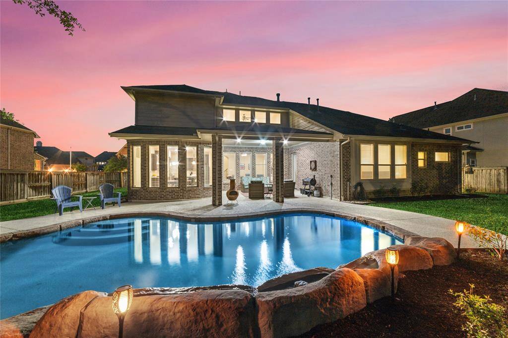 Twilight time at 10510 Comeaux Lane!  Gorgeous evenings in the relaxing back yard