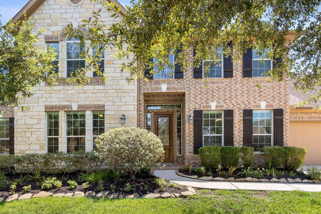Freshly stained shutters & sparkling clean windows providing an abundance of natural light.