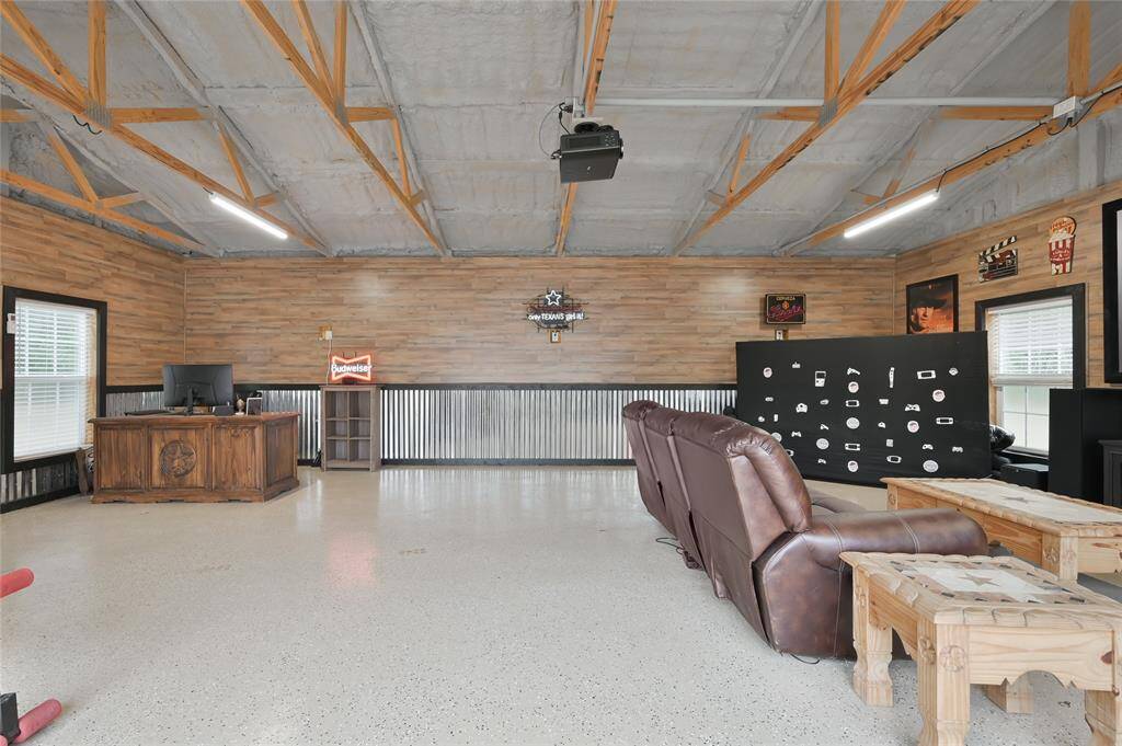 Epoxy floors, large metal commercial grade doors, and no interior posts (all open space)