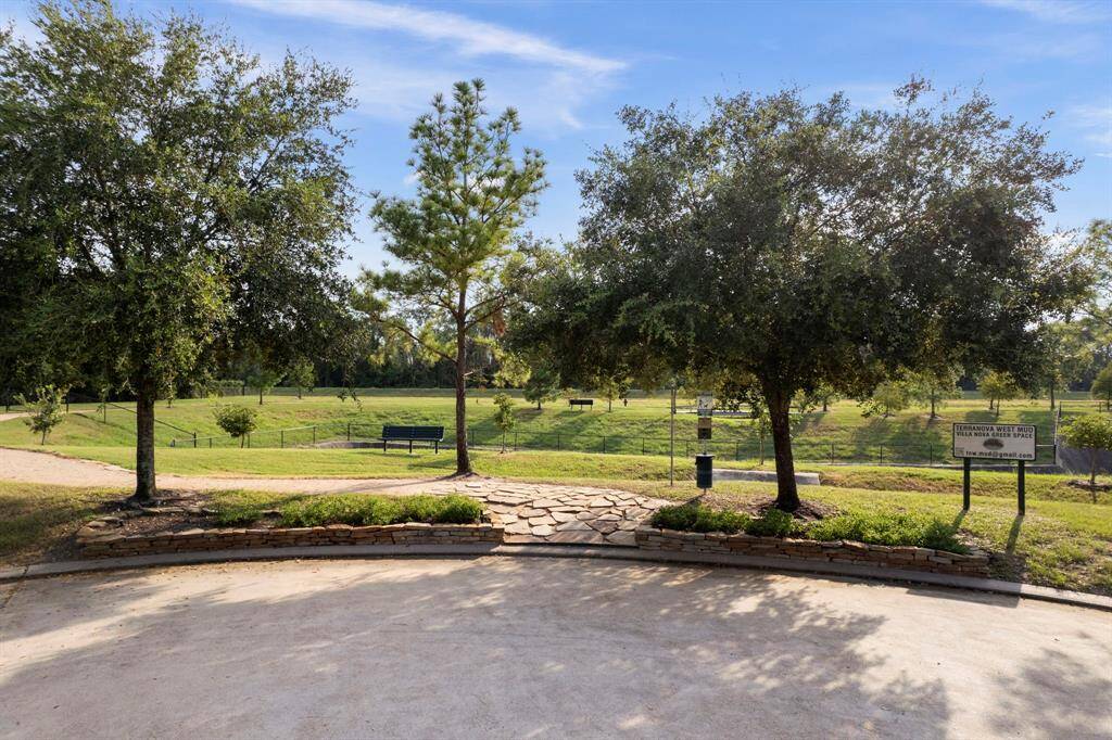 Just outside your front door you have access to this greenspace and walking trails.