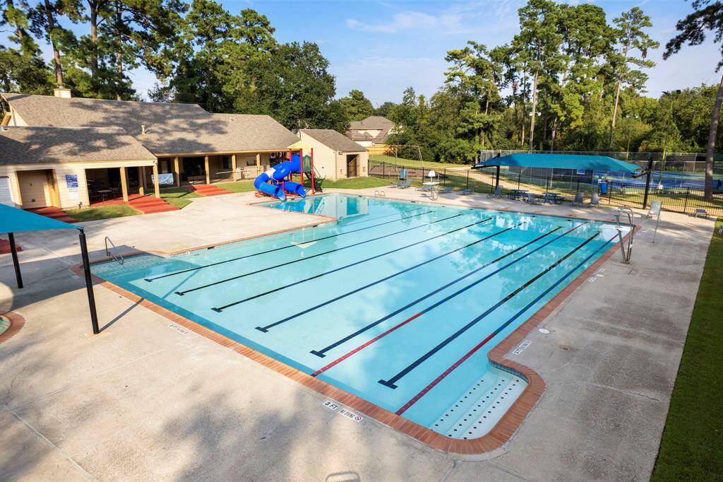The neighborhood swimming pool provides hours of entertainment.