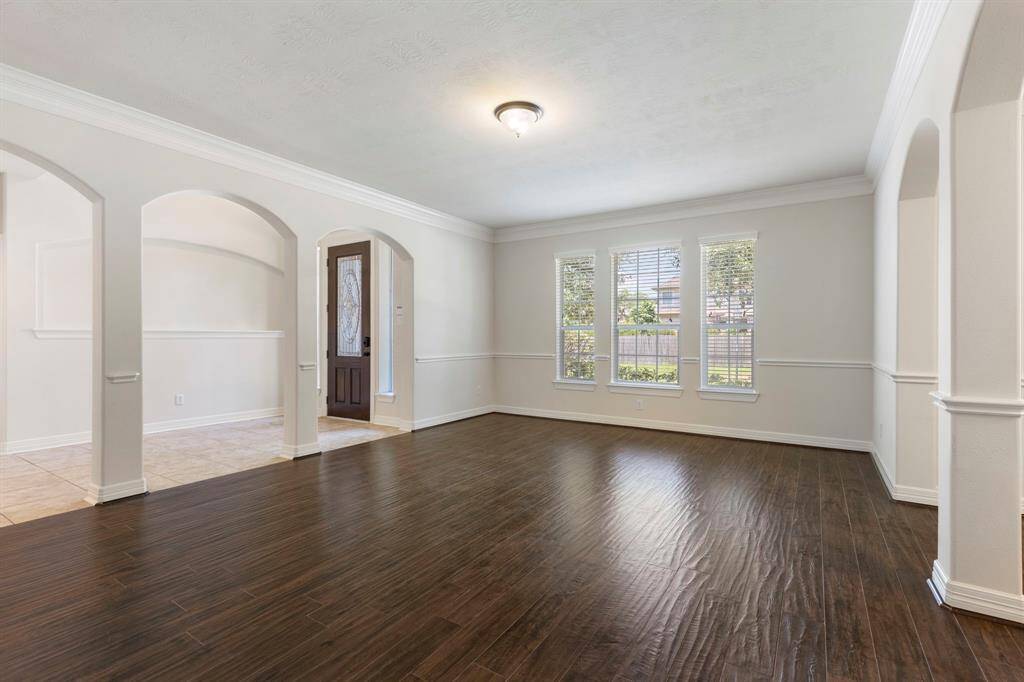Formal living room could be used as a sitting room, hobby/music room and more.