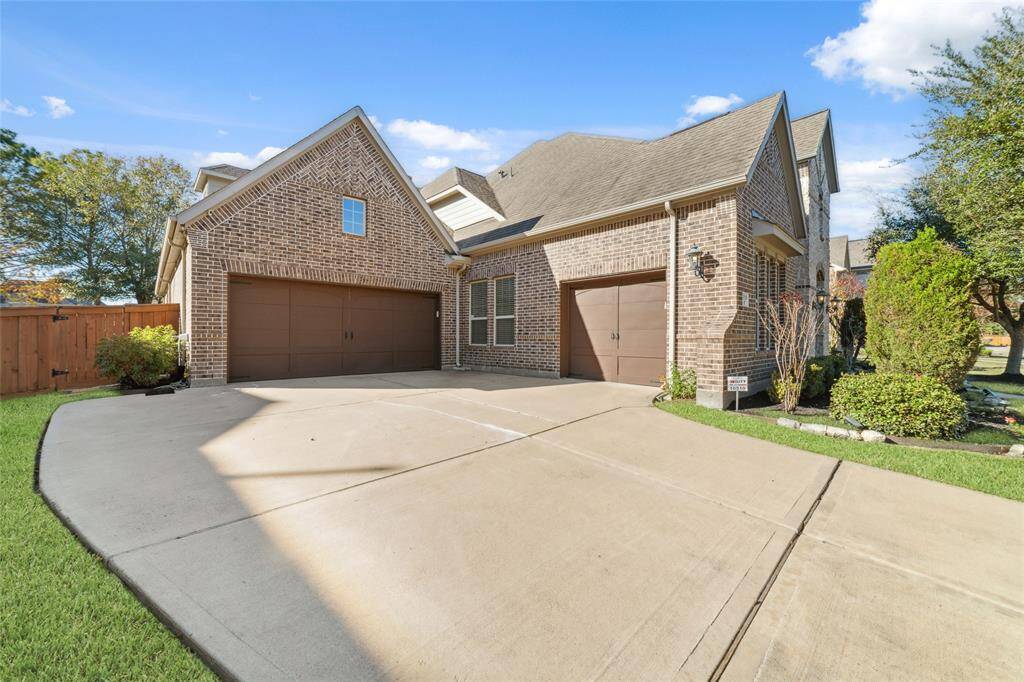 The home has a 3-car garage, and double wide driveway