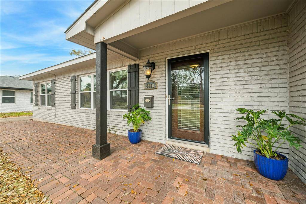 Guests are welcomed into this beautiful home through an impressive covered porch, offering a warm and inviting first impression.