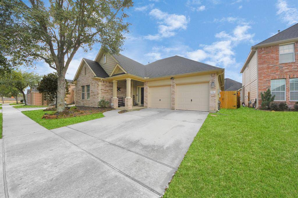 2 car garage with plenty of driveway space