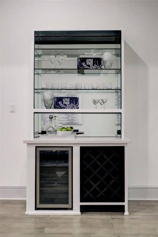 Beverage refrigerator and custom wine storage.