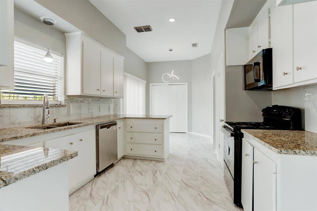 Appliances recently installed and a nice breakfast area and utility room in the home
