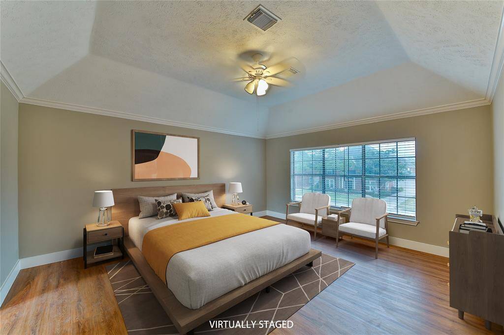 Primary bedroom on opposite side of the hall from other bedrooms for more privacy