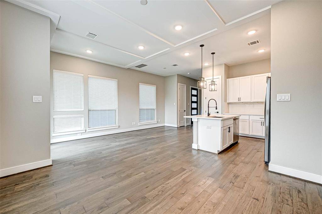 The home has a very open floorplan with a combined living, dining, and kitchen area.