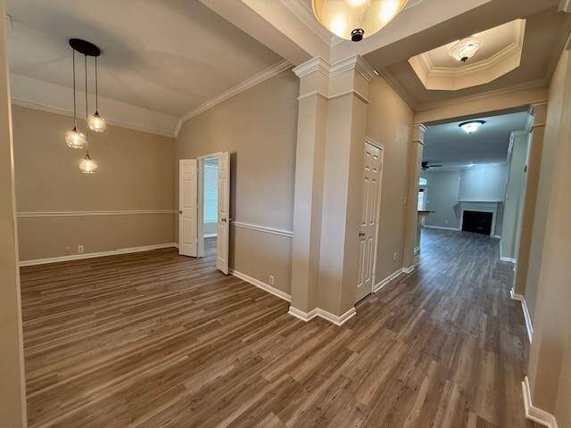 View as you enter the home - Formal dining on left with double doors leading into kitchen