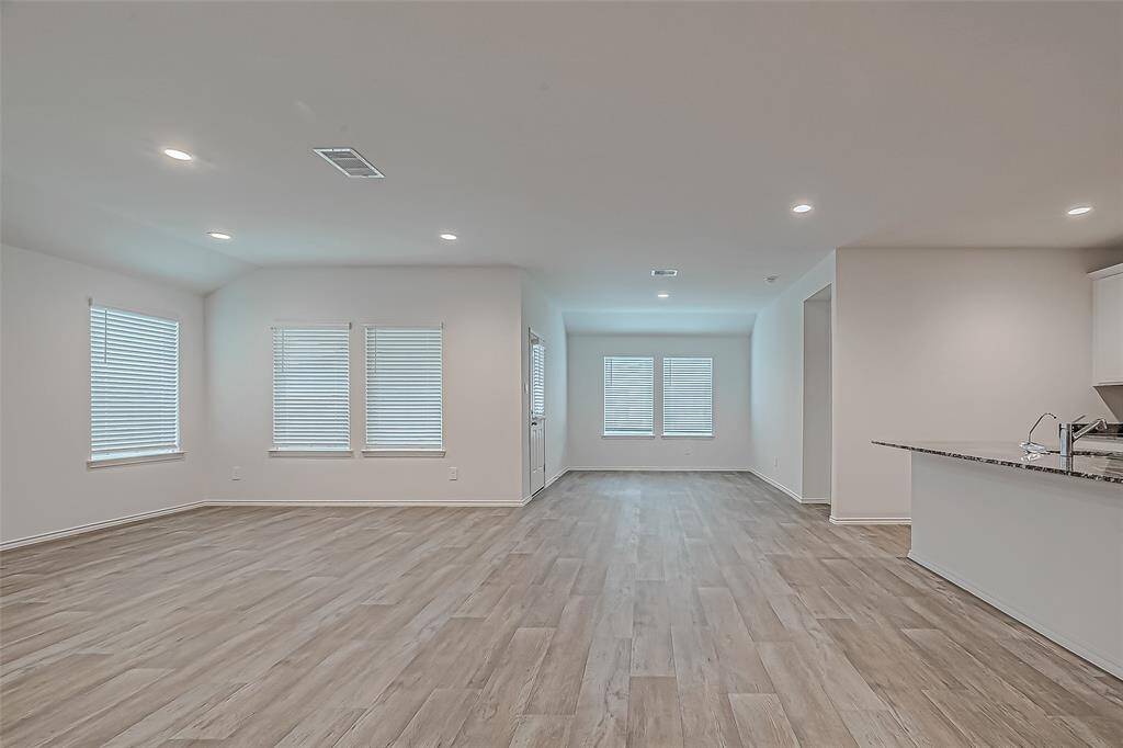 Open Concept! Durable luxury vinyl flooring adds a modern flair while offering low-maintenance living.