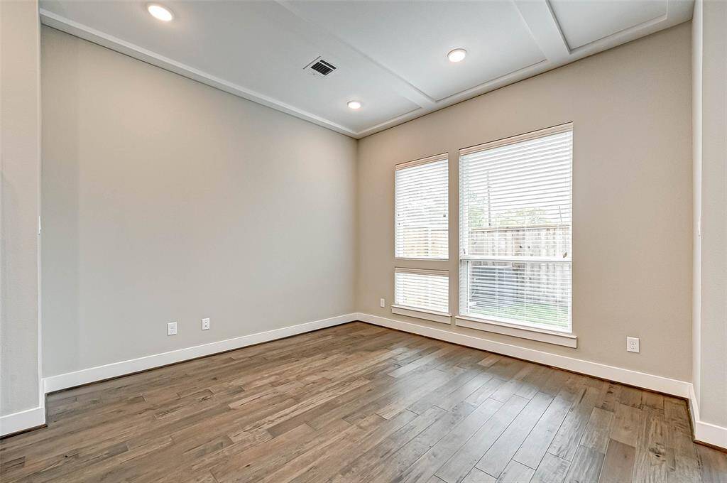 The 12x12 SF dining room has a view of the back yard.