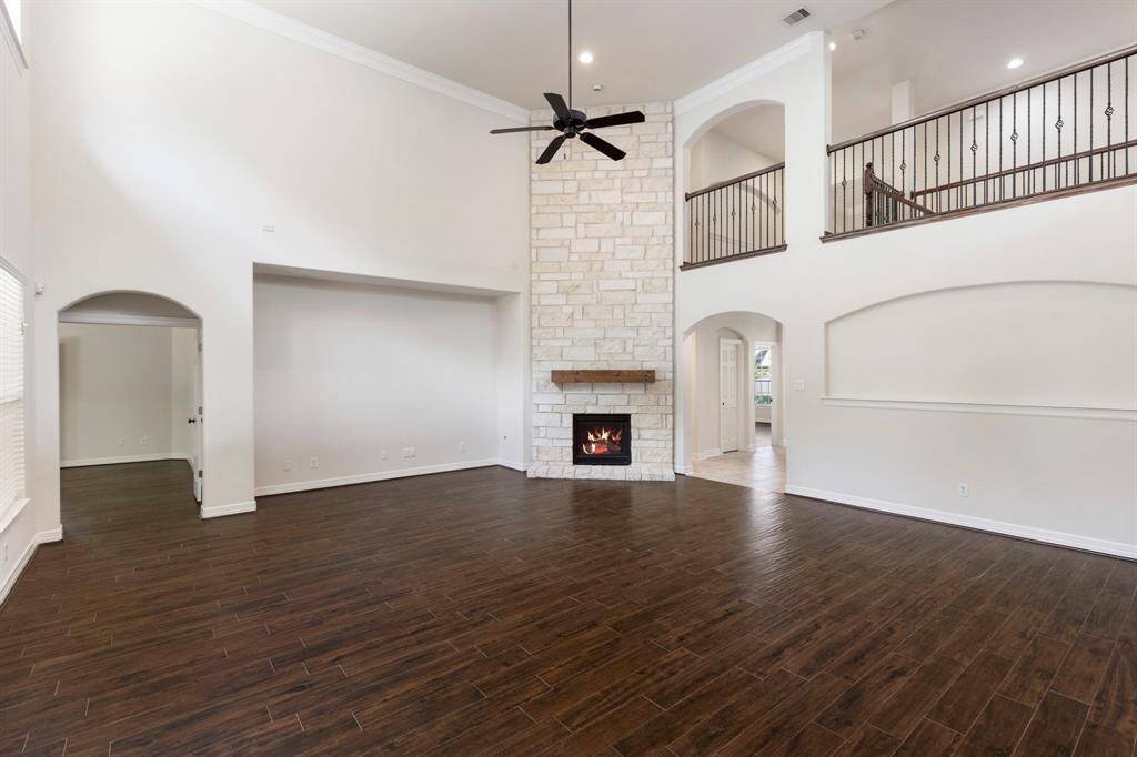 Exquisite 2-story stone fireplace in the den.