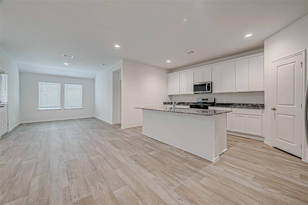 Open Concept - Family and kitchen area.
