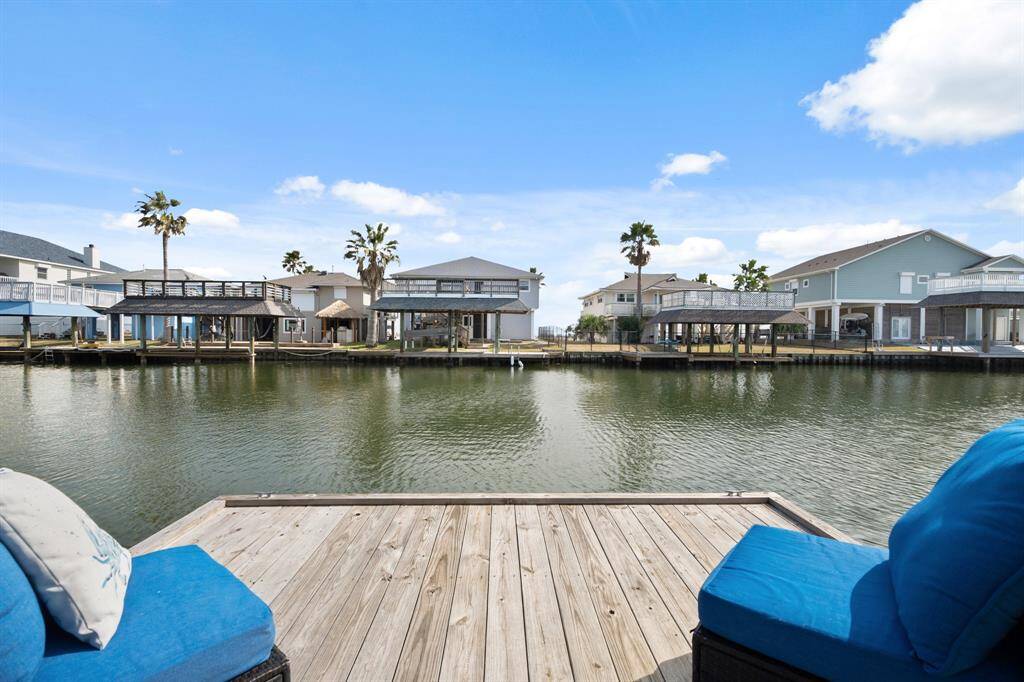 Imagine stepping onto your own private dock, where the stresses of the day instantly dissolve into the gentle rhythm of the water. This serene canal-front property offers a picturesque setting perfect for unwinding and enjoying the beauty of nature.
