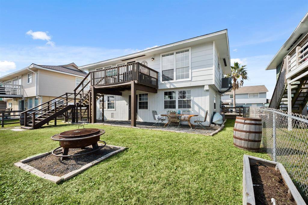 Imagine hosting unforgettable gatherings in your expansive backyard, complete with a cozy fire pit and a stylish patio perfect for dining and cocktails. This outdoor haven offers the ultimate setting for entertaining, where you can enjoy evenings under the stars with family and friends.