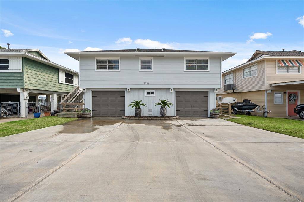 Parking is not an issue at 1222 Sailfish St.  The property has a 2 car garage and a concrete oversized driveway.  Flowers and/or plants have been added digitally.