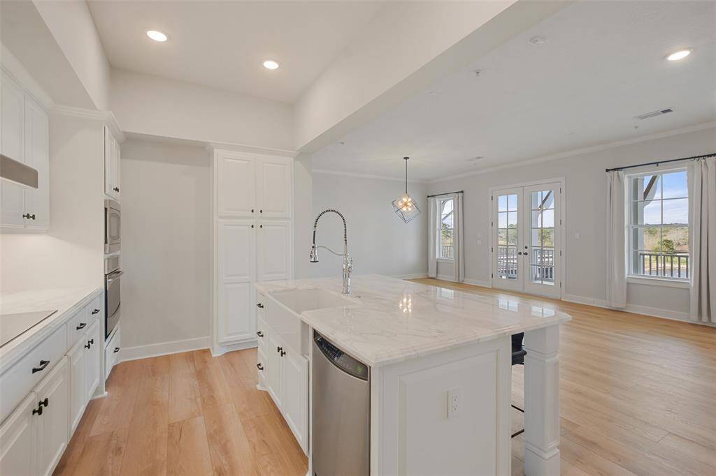 Take a seat at the breakfast bar and enjoy the lake views!