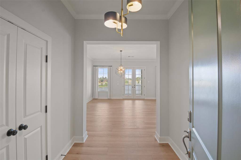 Condo 3C is located on the 4th floor and is accessible by an elevator or stairs. The inviting foyer with a large storage closet and updated LVT directly opens to the dining room and living room.