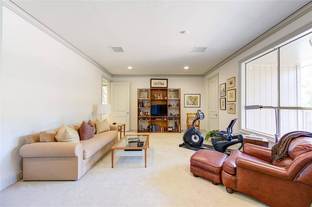 3rd bedroom current used as an upstairs lounge. walk-in closet + large window bringing in natural light.