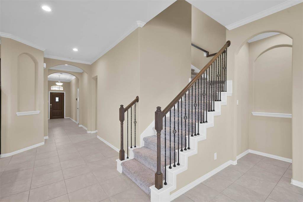 Let's head upstairs to the game room that has the convenience of a half bath!  Or maybe you need space for a 4th bedroom!