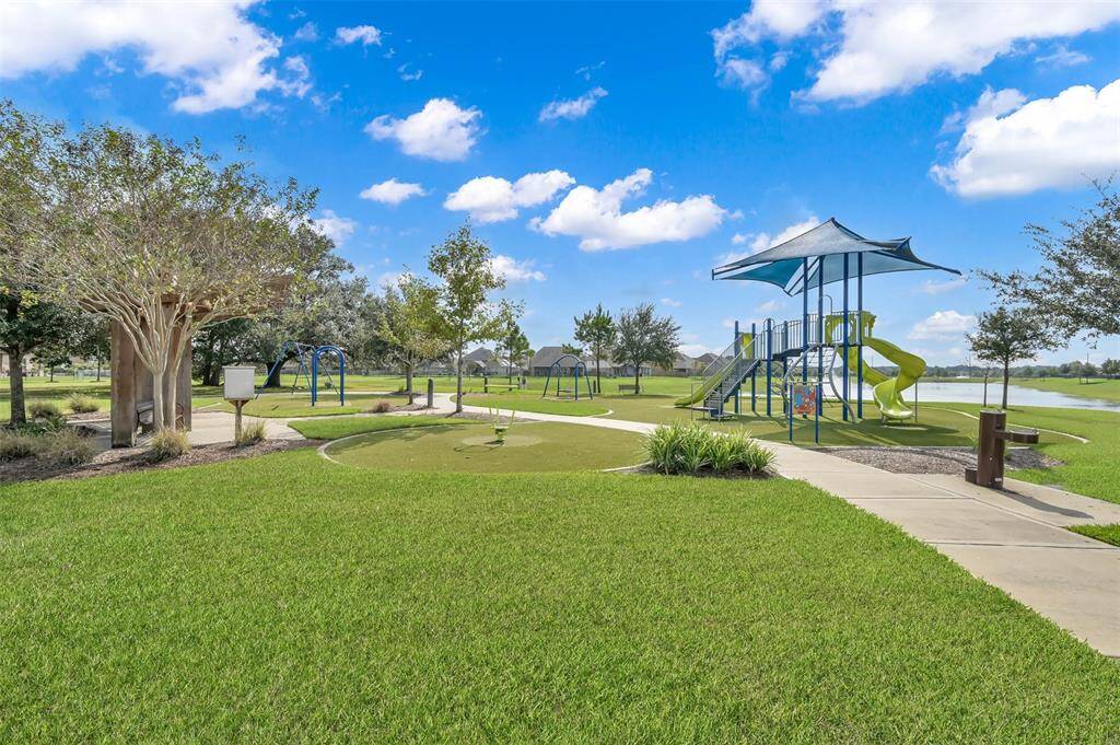 Covered slides and play area, walking trails, community ponds