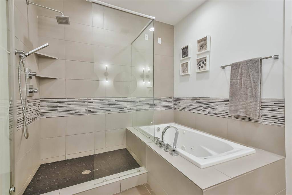 Spa-style bathroom, with large shower and jetted tub