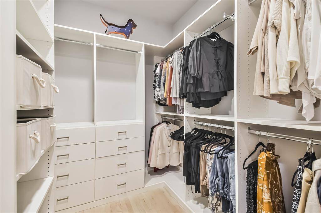 Primary bedroom walk-in closet #1