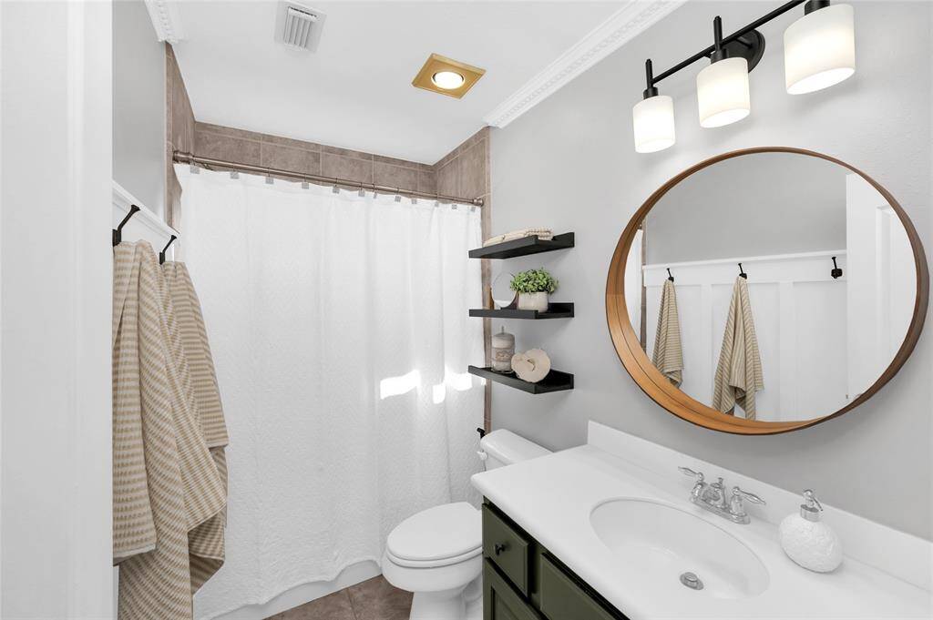 The bath includes a tub and shower combined.