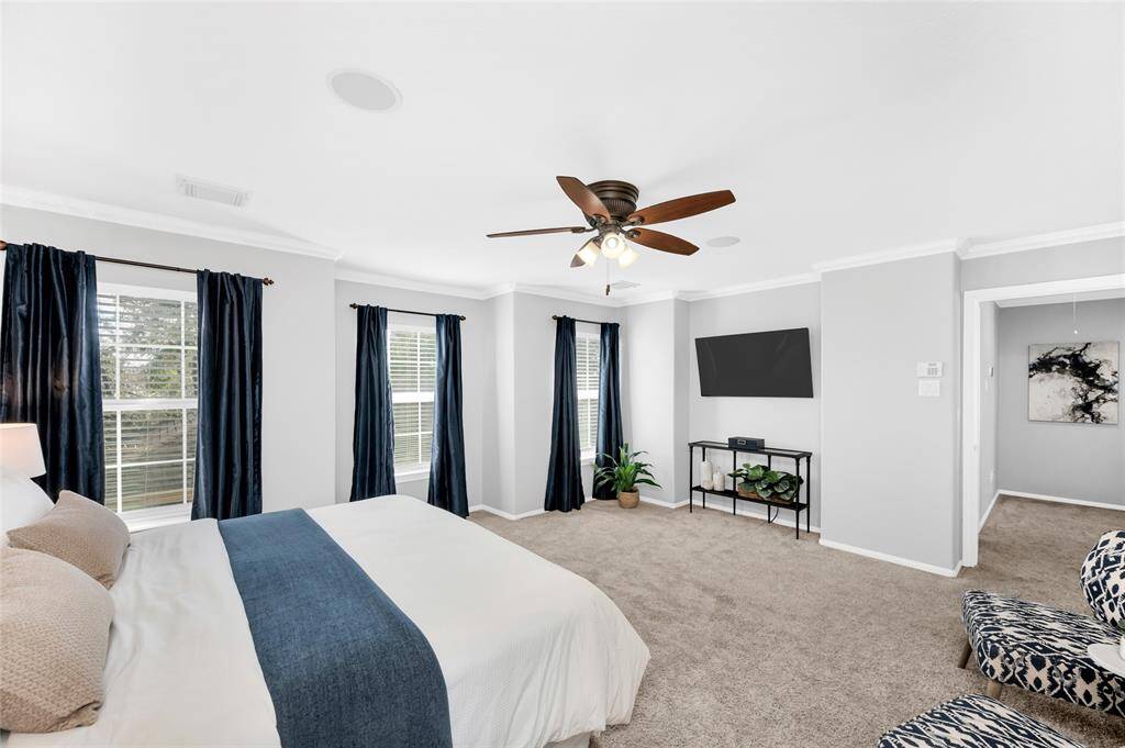 Big primary suite. Yes, that's a king-sized bed. Look at that space!