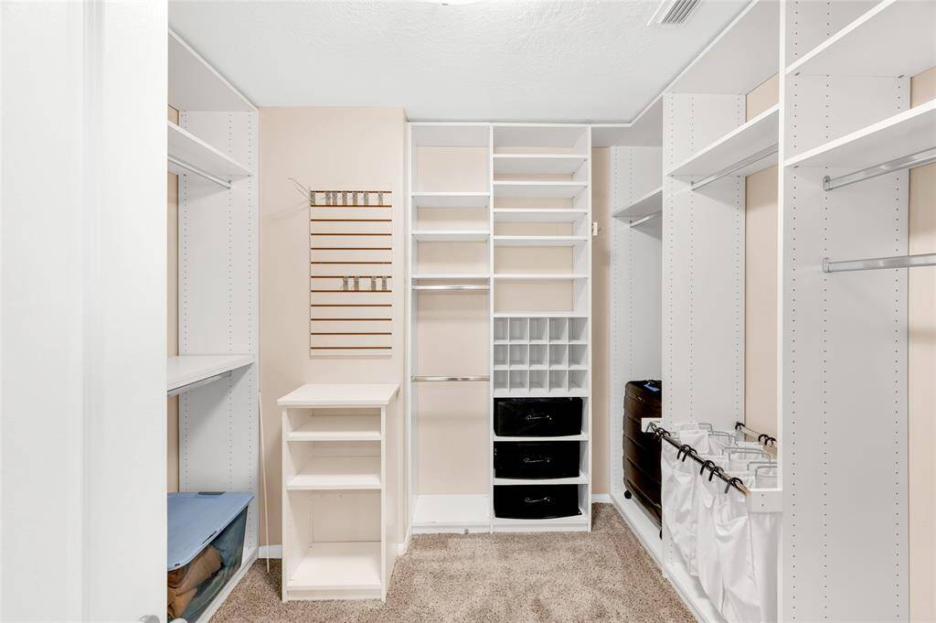 Big primary walk-in closet.
