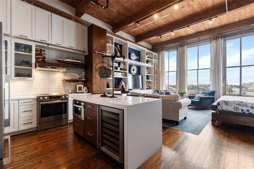 Open kitchen with island and stainless steel appliances