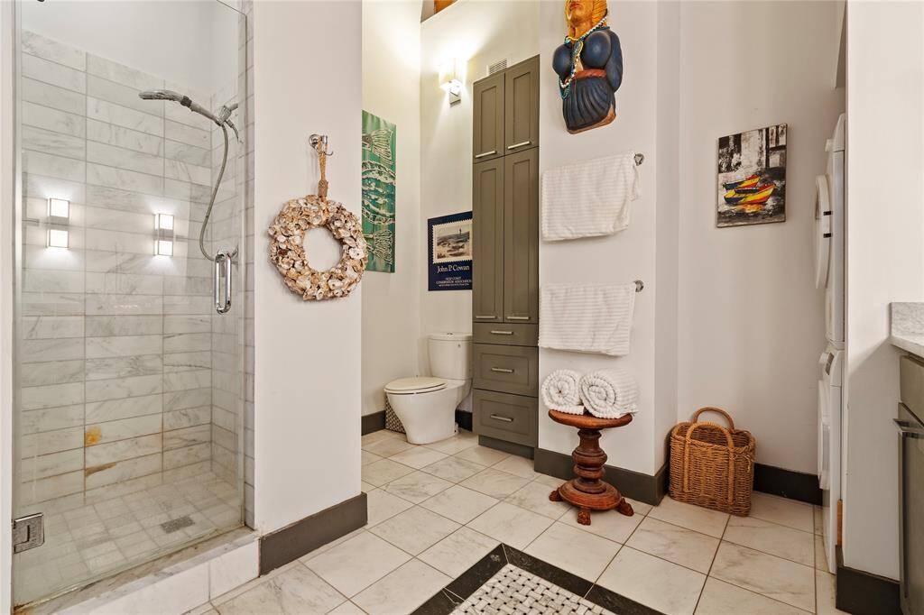 Bathroom with walk in Marble shower