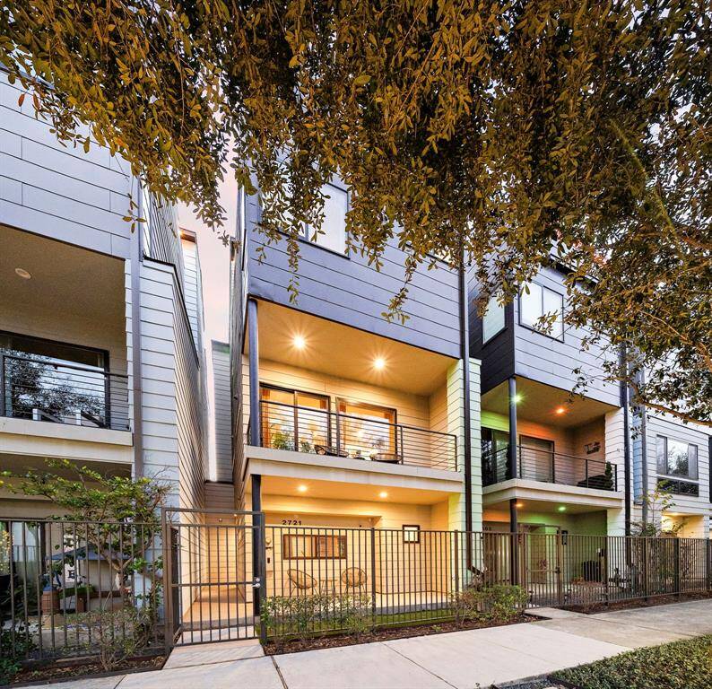 Situated at 2721 St Emanuel Street, this three-story home showcases a modern façade with clean lines and a secure gated entry. The low-maintenance courtyard complements the contemporary style, creating an inviting approach. Enjoy proximity to Houston's popular destinations and the convenience of urban living.