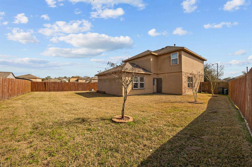 Expansive backyard with limitless potential for family fun and activities. Don't miss out—schedule your viewing today!