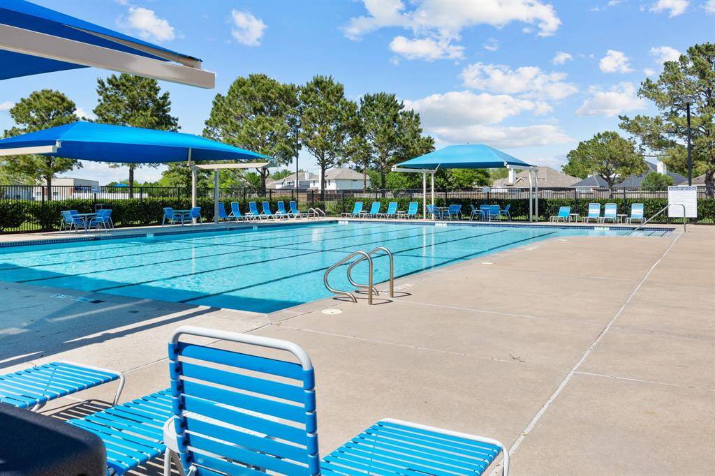 Enjoy the spacious community pool, perfect for relaxation and fun!