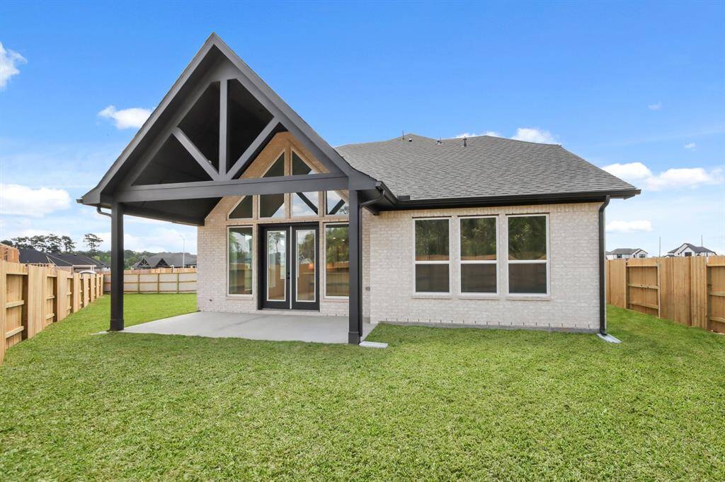 Extended back patio on an oversized lot.