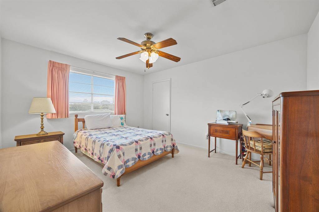 Large Bedrooms with Ceiling Fans and large Windows.