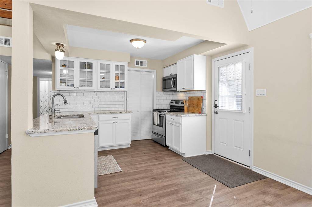 Refrigerator is located in the pantry.