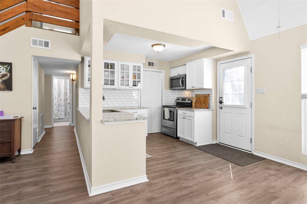 Refrigerator is located in the pantry.